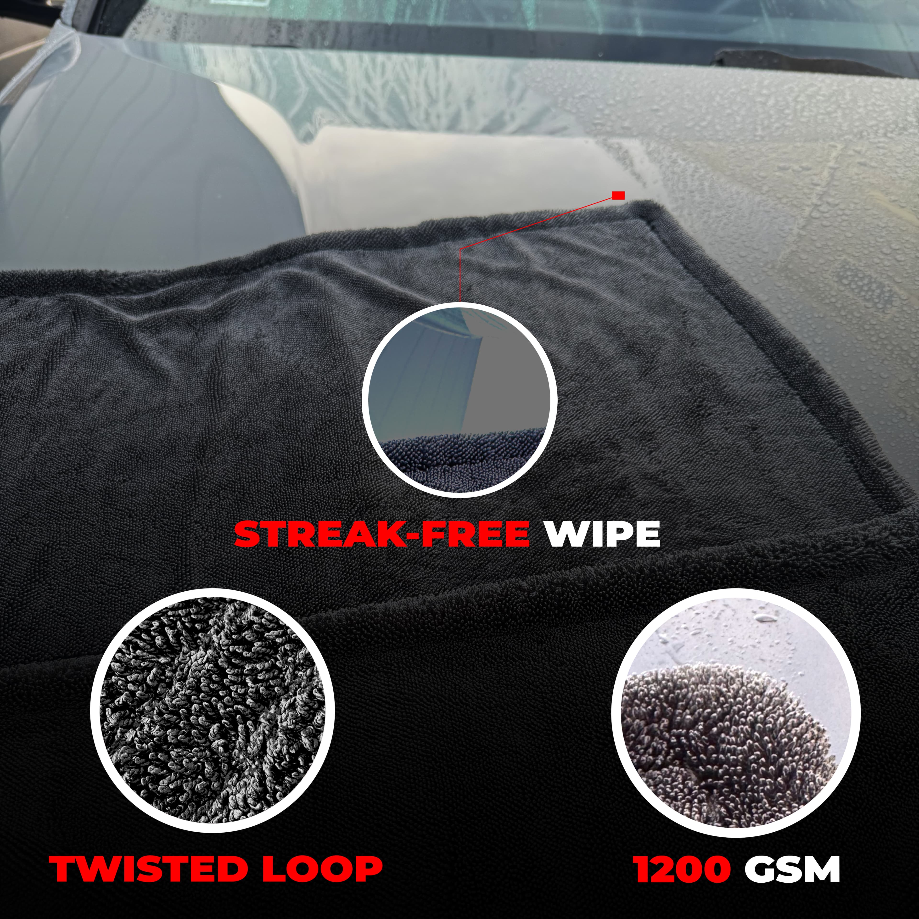 Close-up of the BlackFiber towel's twisted-loop microfiber pile, labeled 1200 GSM